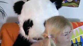 A cute girl has sex with her favorite bear Panda