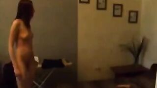 A cute Russian girl caresses herself in the kitchen, feeling lustful