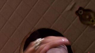 A sexual woman fucked in the toilet hole and received sperm on her face