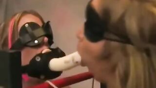 Two girls are having fun with each other with a tough entertainment