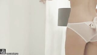 A blonde skinny teen masturbates her hairy pussy with passion