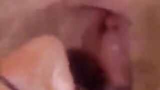 A cute girl in pantyhose shows her hairy pussy to the guy