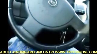 A blonde amateur gives a blowjob to her taxi driver in the car