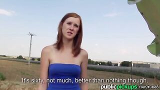 A red-haired girl is fucking on a haystack in the woods