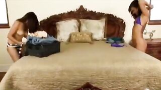 A hot chick is fucking with an Asian guy on the bed