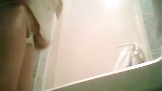 A girl pissed in the toilet, not knowing there was a camera