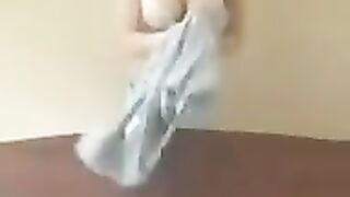 A chick with big milk is doing a master class on how to handle