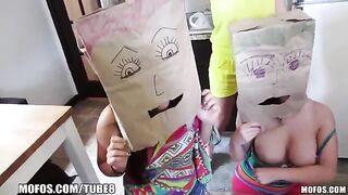 The little girls wear on their heads bags with some sexy content