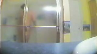 A girl took a shower, not suspecting that there was a hidden camera