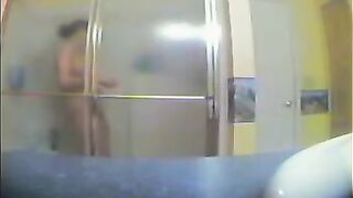 A girl took a shower, not suspecting that there was a hidden camera
