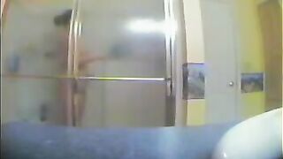 A girl took a shower, not suspecting that there was a hidden camera