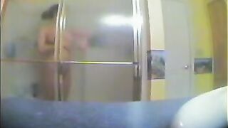 A girl took a shower, not suspecting that there was a hidden camera