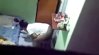 A girl did not know that there was a camera in her room in the hostel