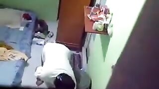 A girl did not know that there was a camera in her room in the hostel