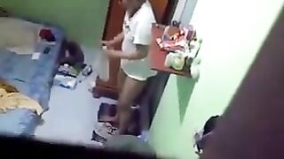 A girl did not know that there was a camera in her room in the hostel