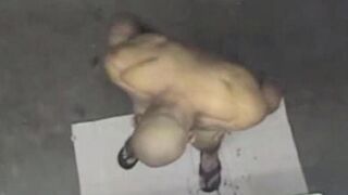 A naked man has been spied on in the shower by a camera
