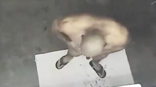 A naked man has been spied on in the shower by a camera
