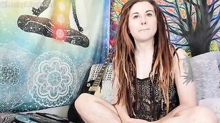A funny hirsute girl gets undressed and reaches a climax in a unique way
