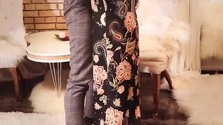Redhead in long black dress, high heels and stockings gets fucked hard
