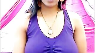 Her nipples are standing through the T-shirt with excitement