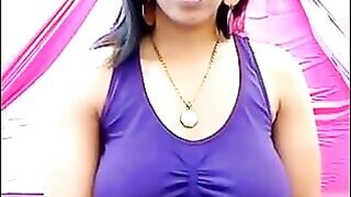 Her nipples are standing through the T-shirt with excitement