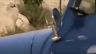 The driver has a steamy encounter with a sexy babe on the road