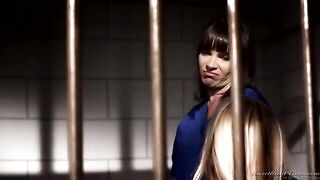 A hot lesbian encounter unfolds in a prison cell with two passionate inmates