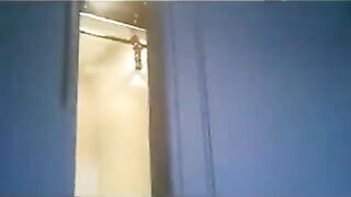 The wife is running in the apartment with a thong on
