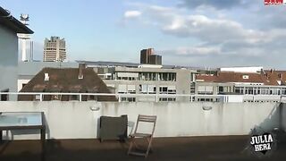 Brunette with big tits bouncing on the roof in HD