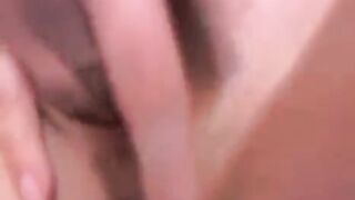A hot Russian chick with small boobs playing with her pussy