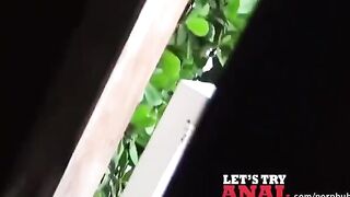 A cute redhead has sex on the bed with a camera