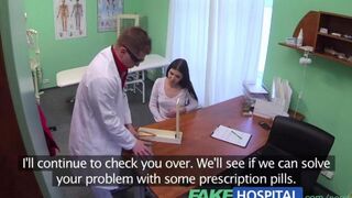 A girl is having fun with her doctor in the hospital room