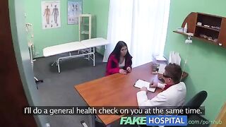 A girl is having fun with her doctor in the hospital room