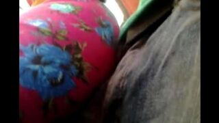 A guy masturbates on a riser with girls on the bus