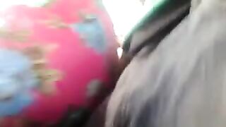 A guy masturbates on a riser with girls on the bus