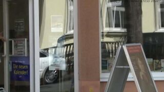 A girl walks down the street without panties, and a guy started to masturbate