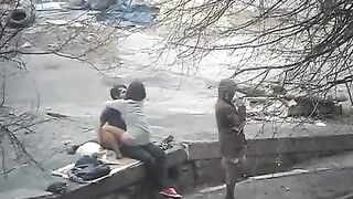 The guy shoots sex with a girl on the city streets