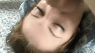 A guy's cock is held in the mouth very deep