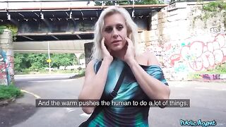 A blonde MILF is getting fucked right out in the open