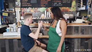 A sexy barista with big boobs will make your coffee for you