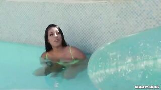 A man is having fun with girls in swimming lessons