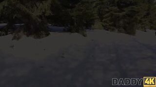 A hot chick is having fun on the sled by the fireplace