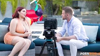 Natasha Nice gets her ass pounded during an interview, showcasing her curvy figure and huge tits