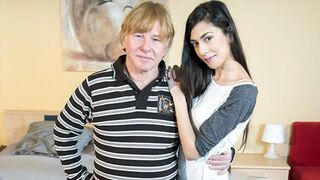 A stepdaughter is getting fucked by her stepdad in a steamy scene