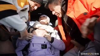 A girl in the car makes a snow angel and gets fucked by two guys