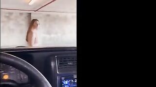 Redhead babe fucked in the public garage, right in front of doors