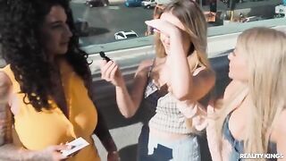 Girls are stripping on the strip, showing their bodies to passers-by