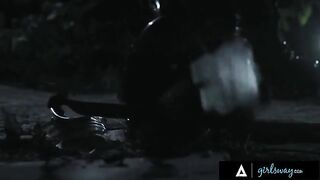 A sexy huntress gets banged by two busty droids in the wasteland