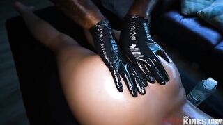 A man makes a massage for his girlfriend in an intimate way