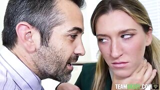 The student is having fun with her teacher and principal in an office